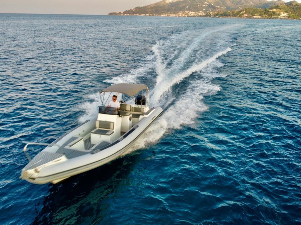 Romantic couple enjoying a sunset yacht cruise.